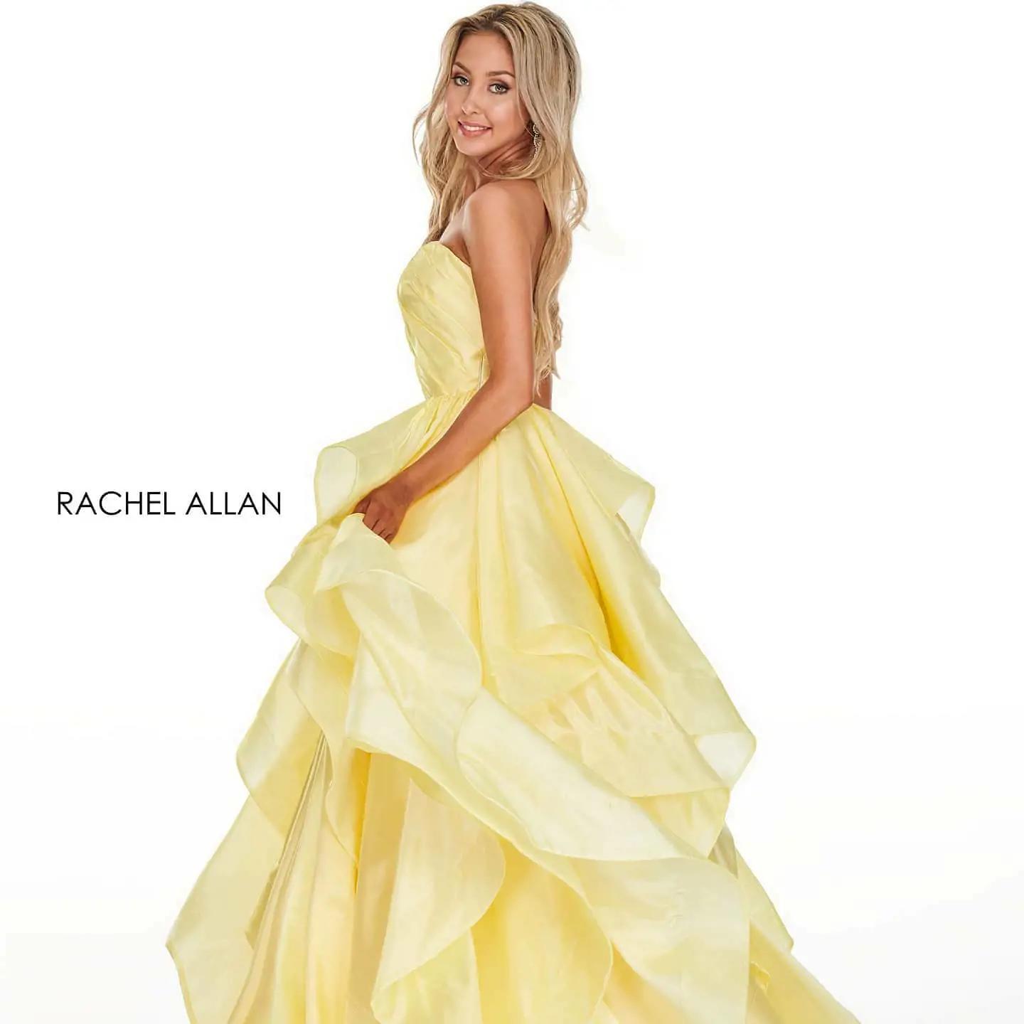 Model wearing a yellow dress. Mobile image